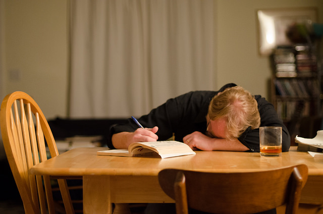 Feeling Burnt Out - Man Asleep on Study Books - entitled "Tuesday" by Tim Pierce